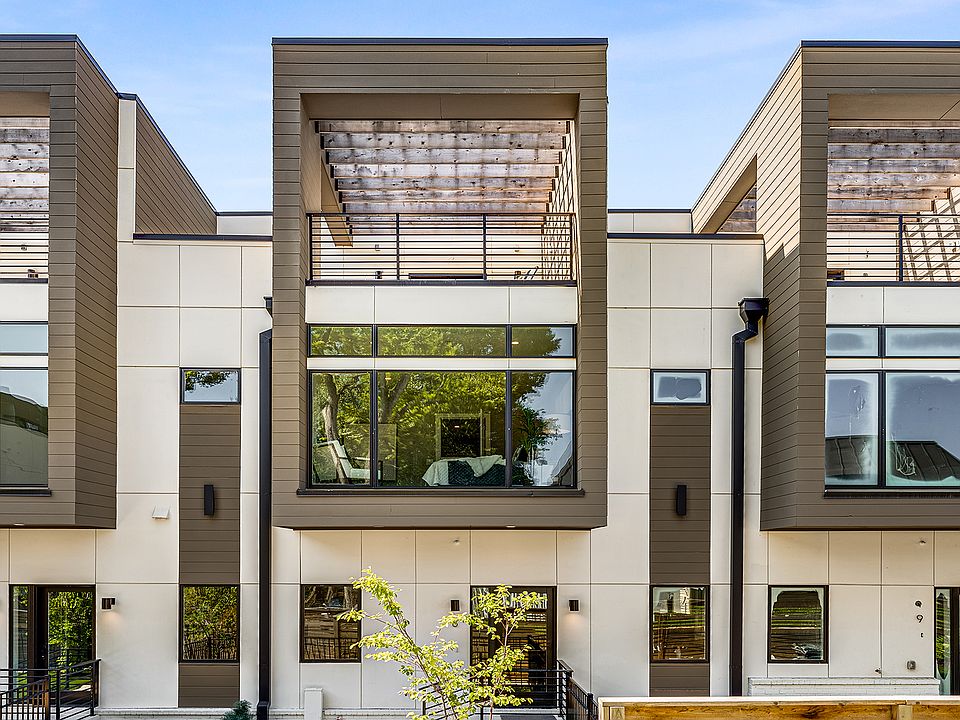 Exterior and front entrance with private fenced yard and rooftop patio