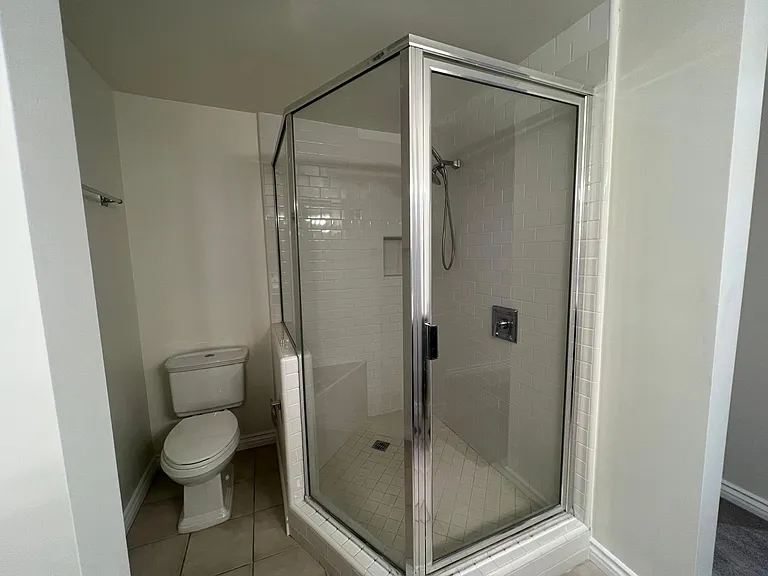 Giant, walk-in shower in master bathroom.