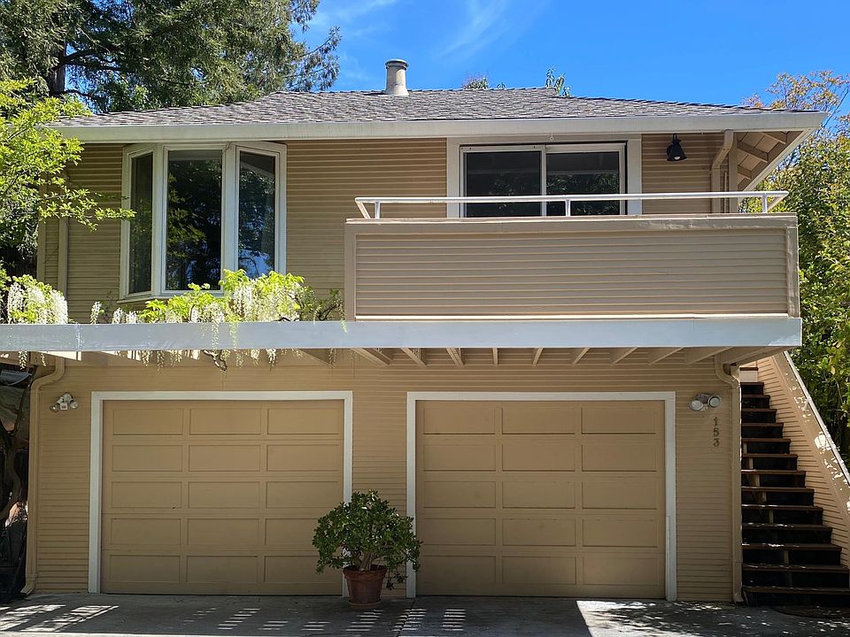 Apartment located above detached garage.