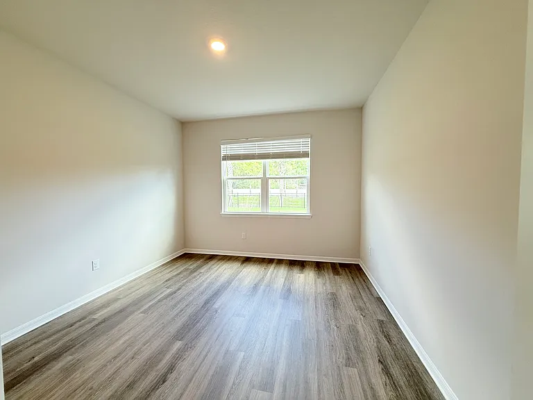 Downstairs Bedroom with private ensuite bathroom.