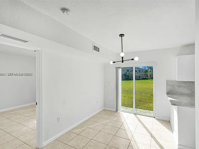 3398 NE 9th Dr #104 — Photo 5