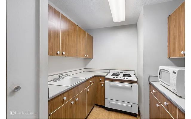 Sold by Douglas Elliman | media 12