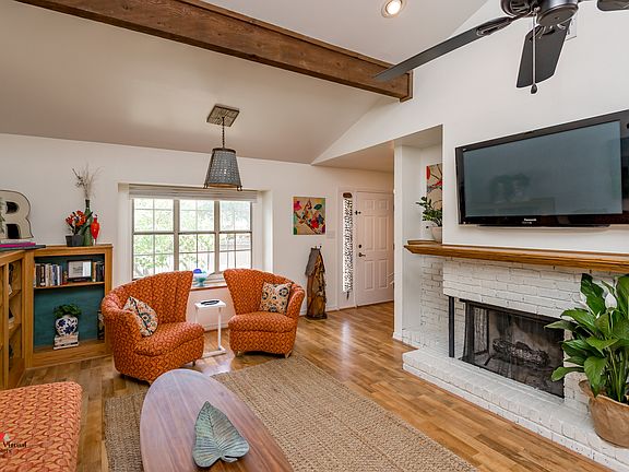 Vaulted,fireplace,flat TV