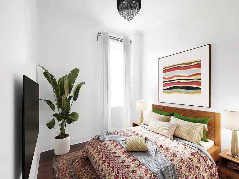 First floor home, back bedroom staged.