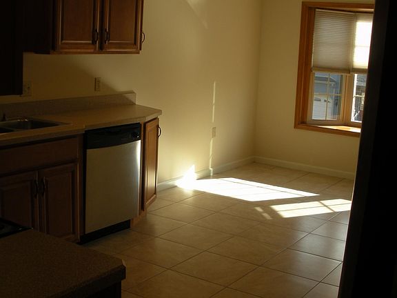 Dining area with sunny bay window.