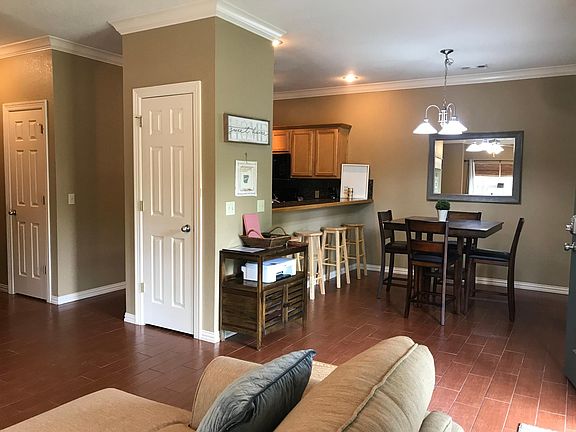 Kitchen w/ Fridge, Oven, Microwave, and Dishwasher