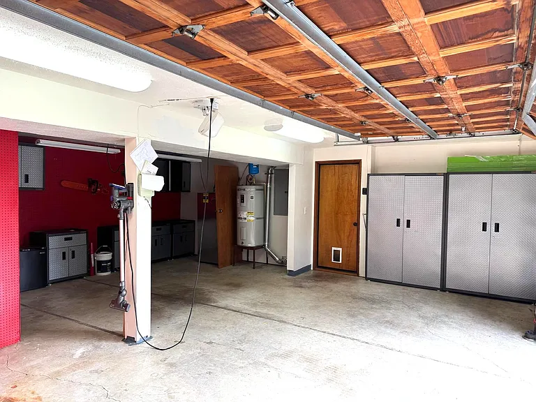 2 car garage with built in storage / tool cabinets