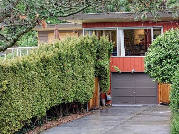 Unique 4 BR, 2.5 bath home with spacious open floor plan and abundance of natural light in lower level!