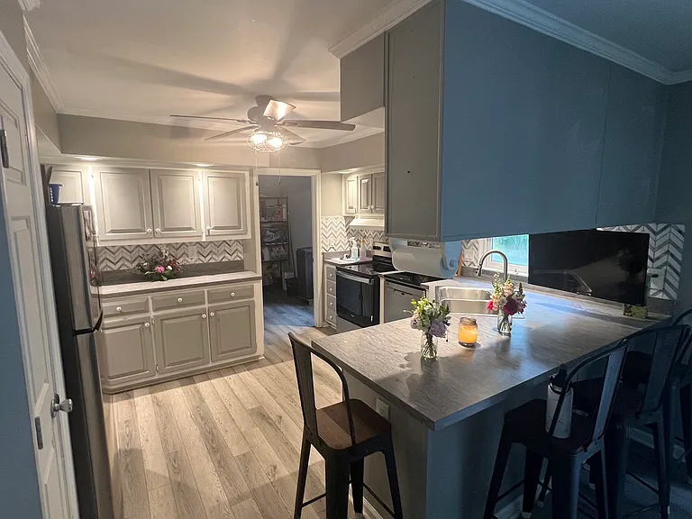TV and bar stools come with