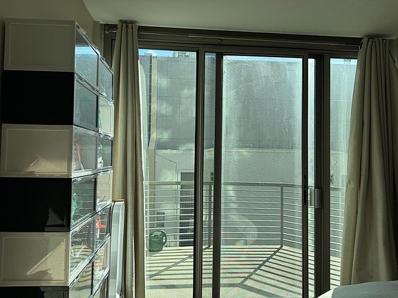 Master bedroom with balcony