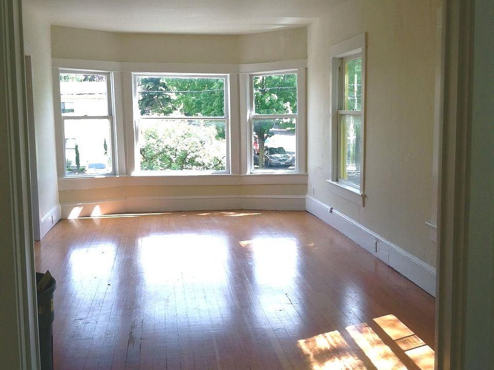 Lots of sun!! Wood Floors, high ceilings & bay windows!
