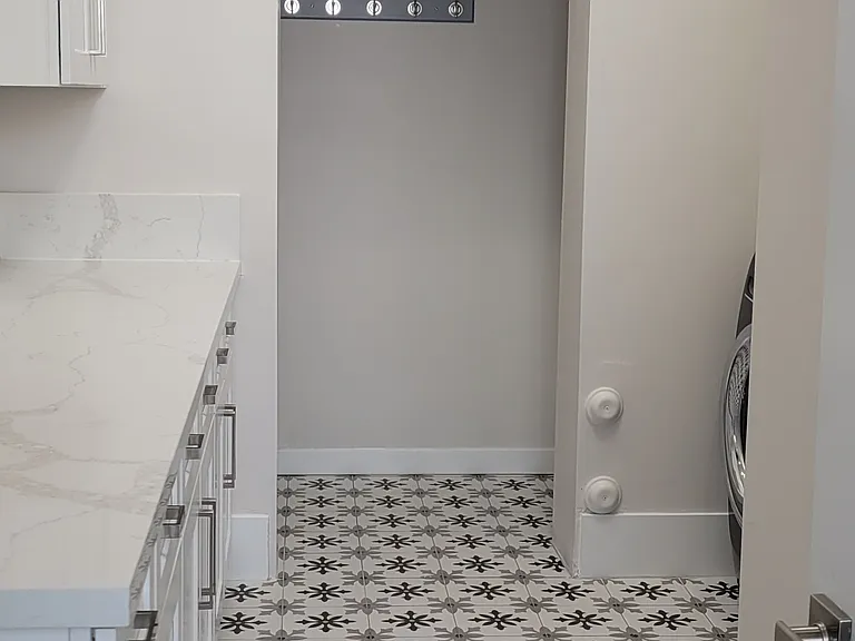 LAUNDRY ROOM WITH MUD ROOM FROM GARAGE