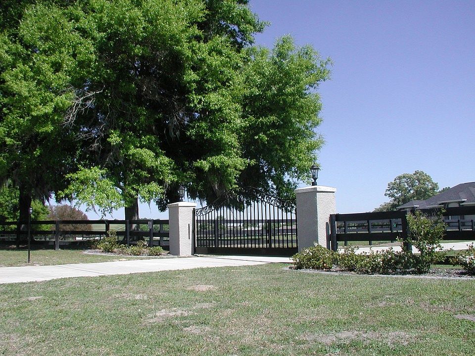 GATED ENTRY AND PAVED DRIVE