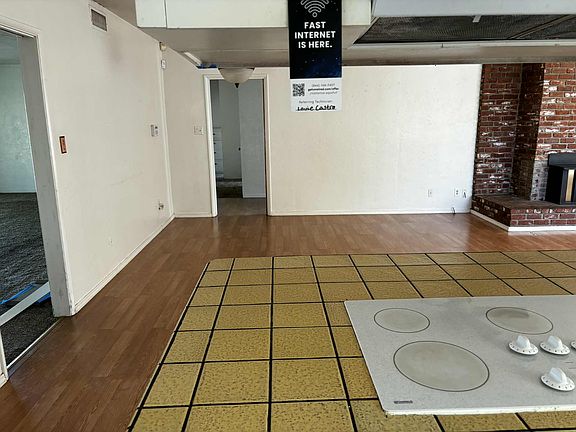 stove top looking into dining/great room