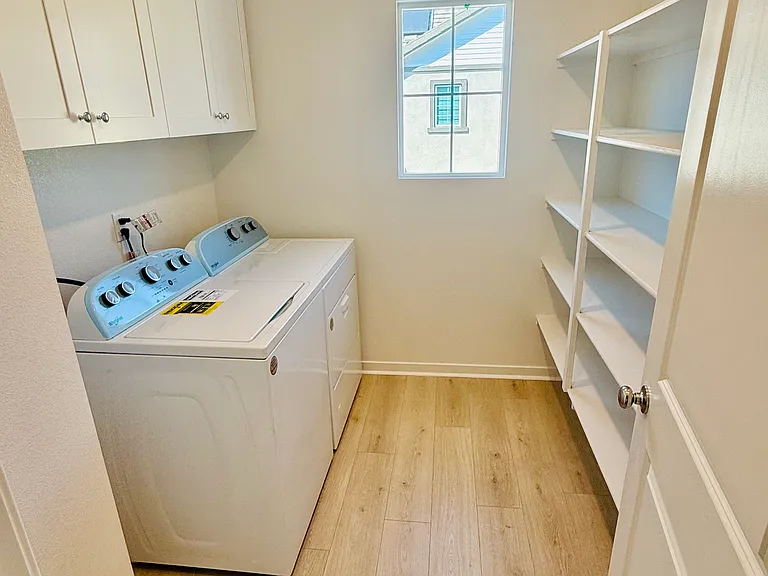 Laundry room with storage