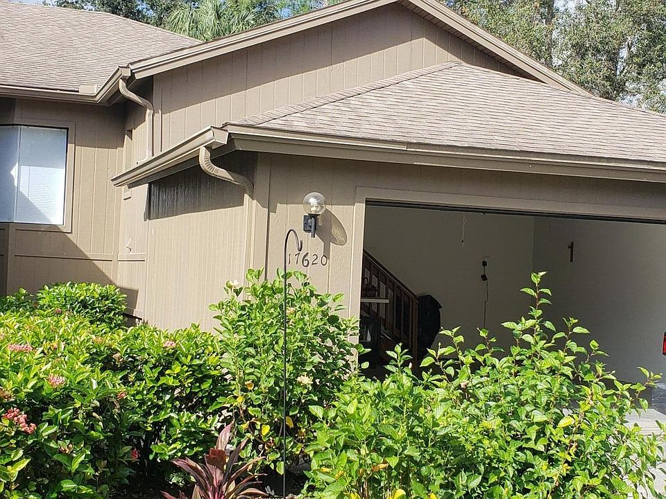 Tropical well maintained property with inground sprinlers!