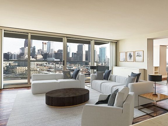 Spacious living room with plenty of nautral light