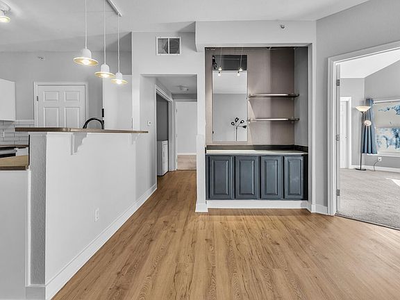 View from the front door - Built in bar/cabinets!