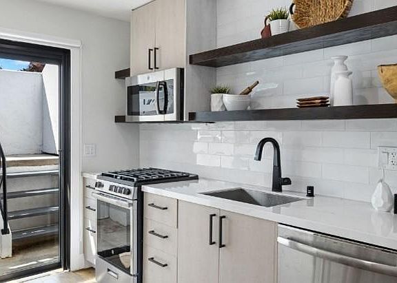 Full, spacious kitchen with access to patio