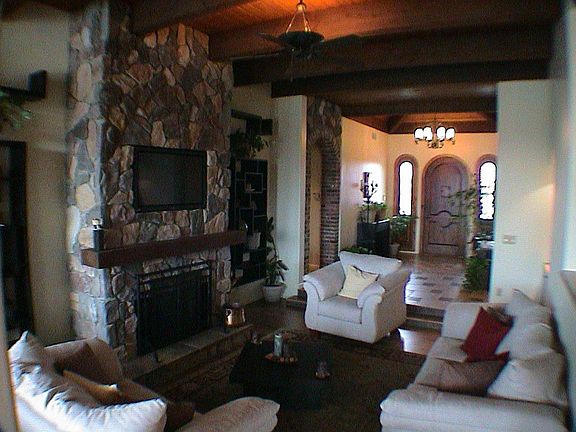 INTIMATE LIVING ROOM WITH PLASMA TELEVISION