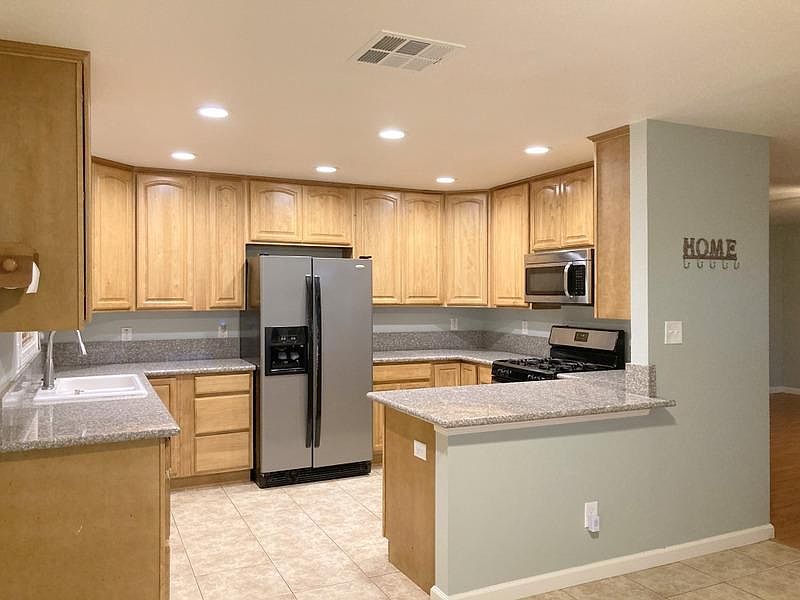 Updated kitchen with lots of cabinets.