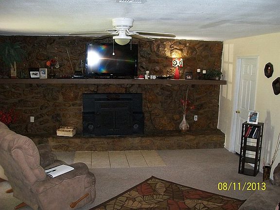 Large living room with fireplace.