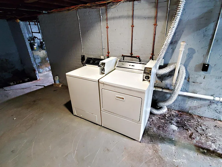 In-basement laundry. Coin operated ($1 per machine)