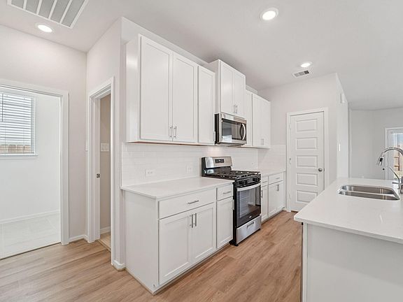 4th image of 5708 Adamite Way