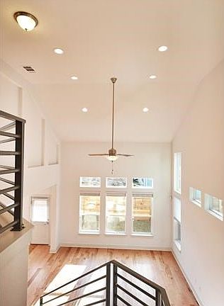 Living Room. Horizontal Rails and Vaulted Ceilings.