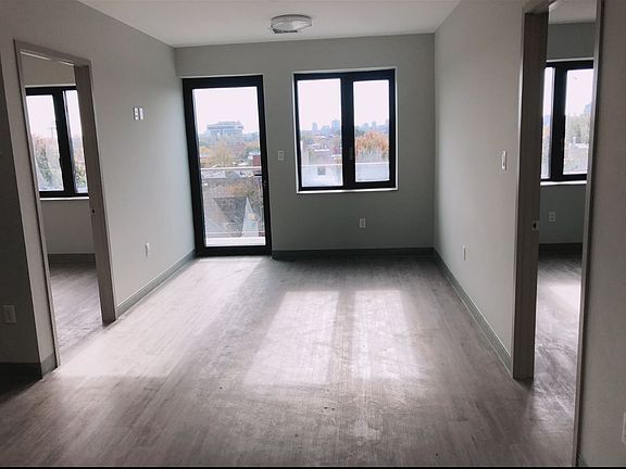 3rd image of 10854 Roosevelt Ave #Townhouse 4