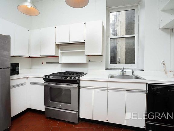 3rd image of 307 E 12th St APT 2C