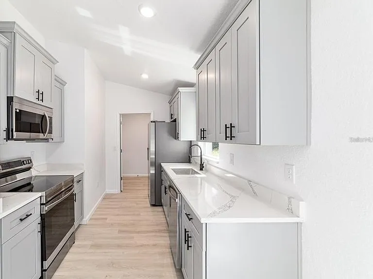 15388 SW 26th Pl — Photo 16