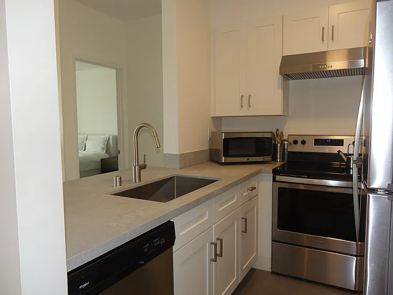 Kitchen with stainless steel sink & appliances