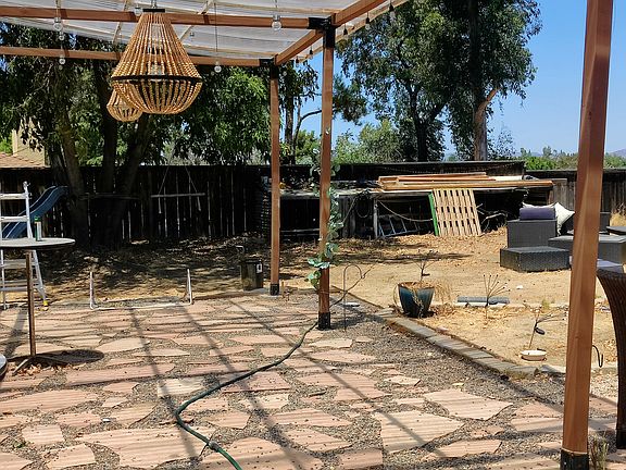 second covered pergola with flagstone and rock ground covering / huge space 30'x14' perfect for evening gatherings with family and friends overlooking an amazing view