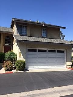 Front view of condo, 2 car garage with direct access to kitchen.