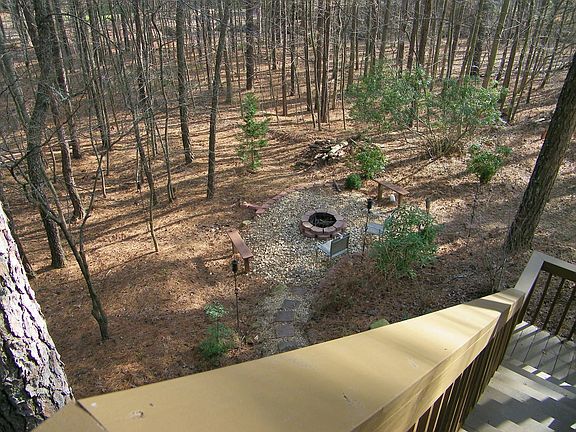 backyard firepit from deck stairs