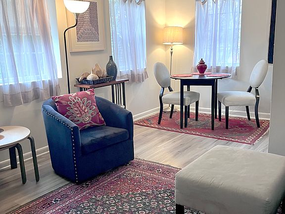 View from hall stairs toward dining area.