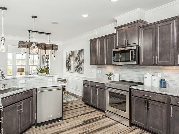Open Kitchen with walk-in Pantry and Breakfast Bar
