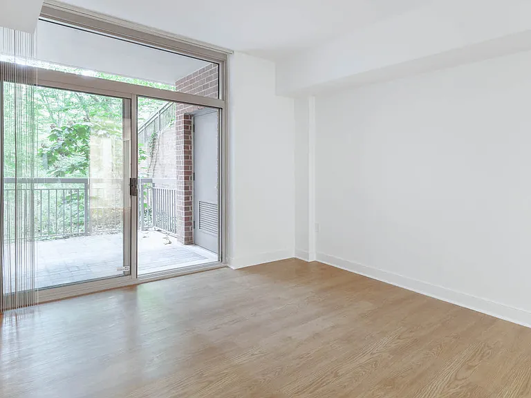 Bedroom with Balcony and Hard Surface Flooring