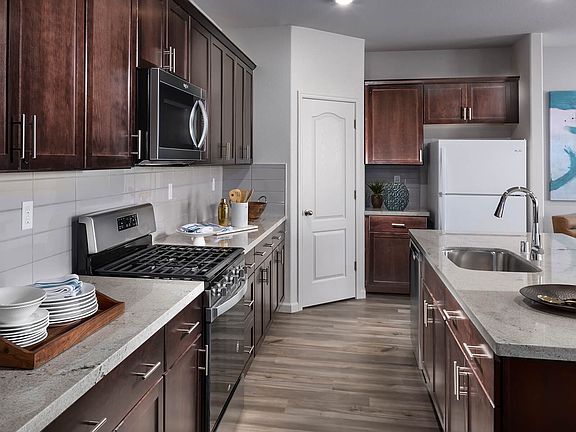 Residence 2 kitchen modeled at a nearby Meritage community.