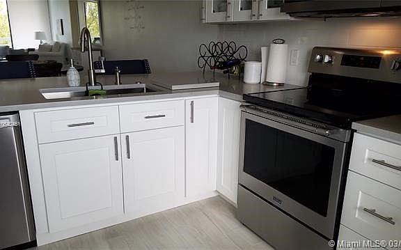 Kitchen Opens to Living Room/Dining Room