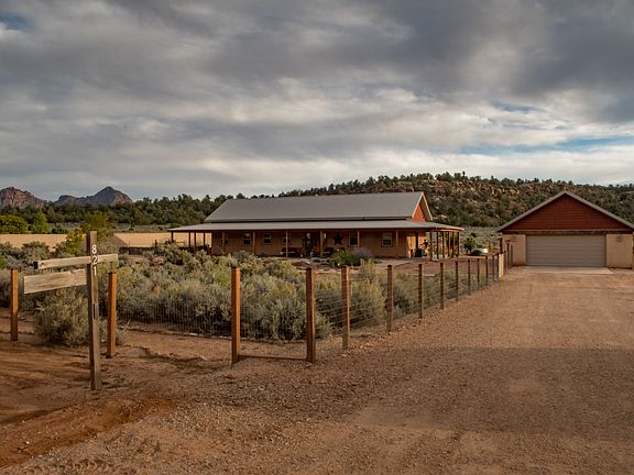 Fenced & set back from road