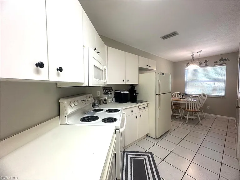 6880 Huntington Lakes Cir #203 — Photo 15
