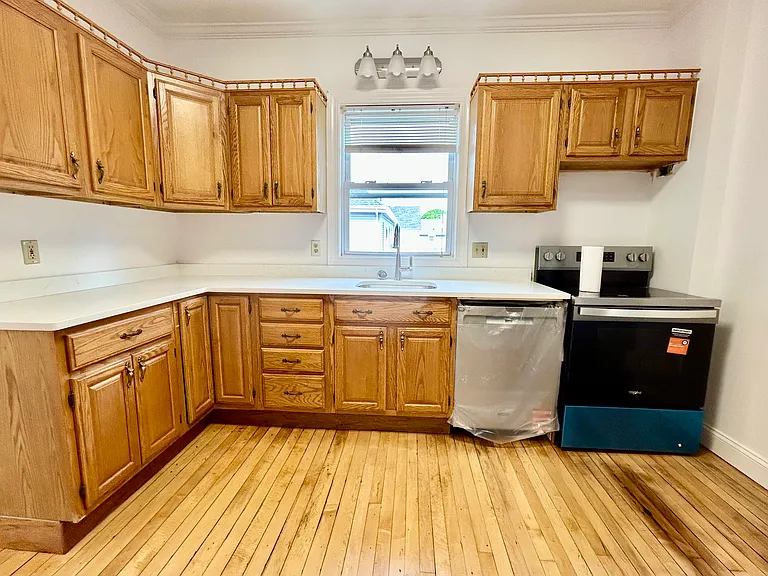 Kitchen with brand new appliances 
New Quartz countertops