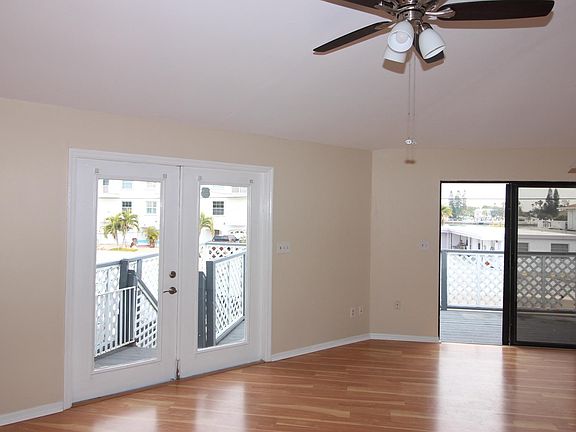 French entry doors and slider to balcony