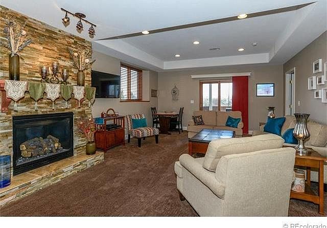 Beautiful fireplace with remote control. High ceilings.