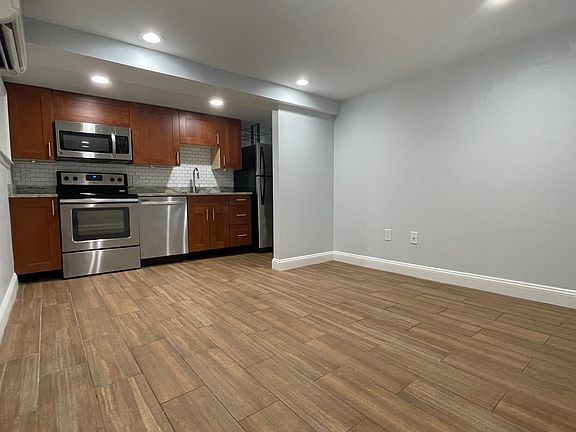 Living Room Opens up to Kitchen