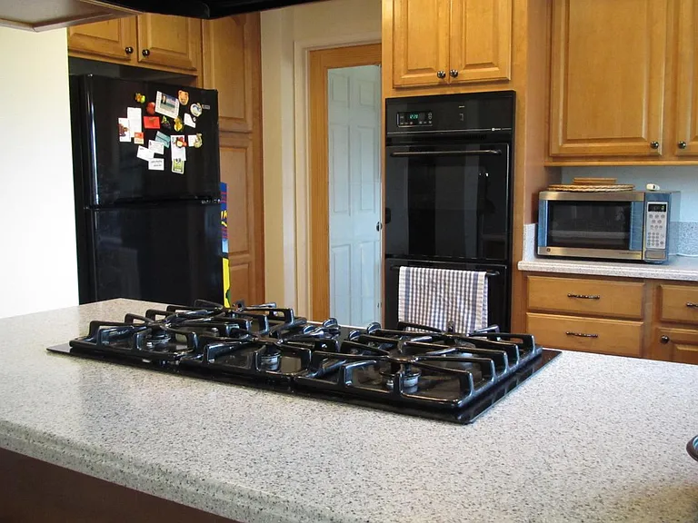 Range, stove top, refrigerator and freezer, oven, microwave