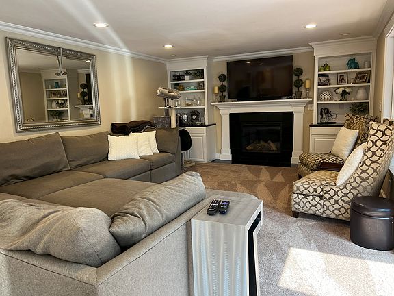 Multiple Living Room Spaces #2, gas fireplace. Main TV: Prime Video, Disney+, Netflix, Hulu, Beachbody, Sling, Apple TV