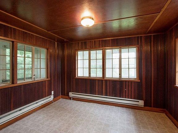 Bonus room/bedroom with windows on three sides.
